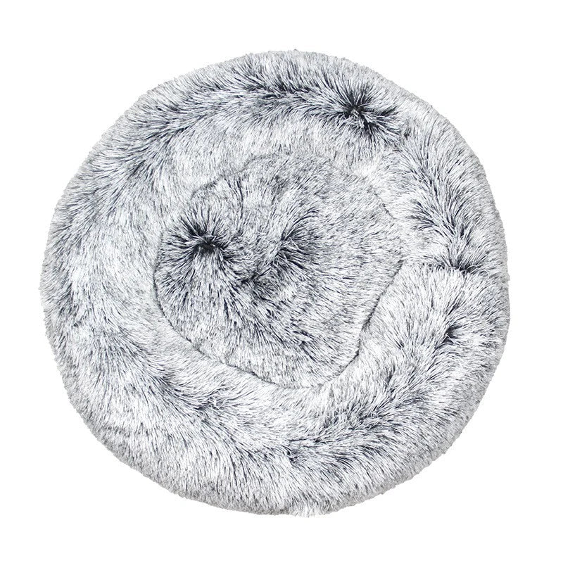 All Dogs Love plush round calming pet bed in grey with a raised rim for head support and cozy long-pile fabric.