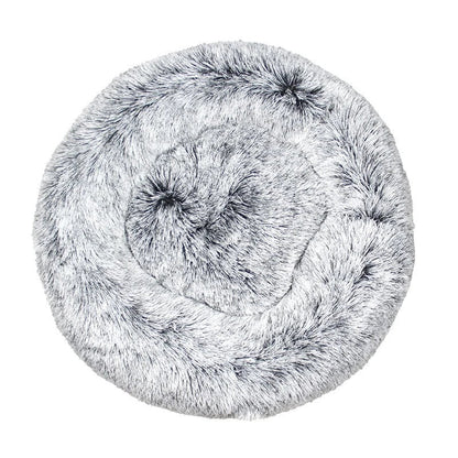 All Dogs Love plush round calming pet bed in grey with a raised rim for head support and cozy long-pile fabric.